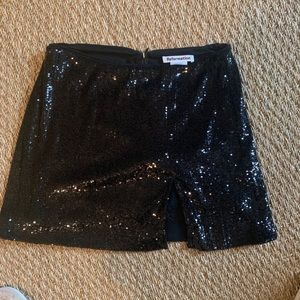 Reformation black sequin skirt with front slit